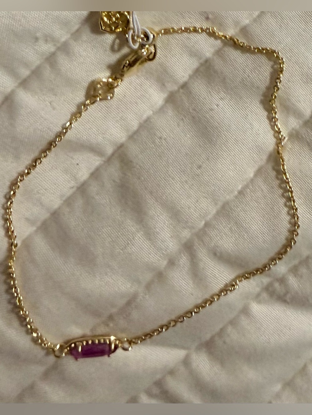 NWT and bag Kendra Scott Gold Bracelet with Purple/pink Stone